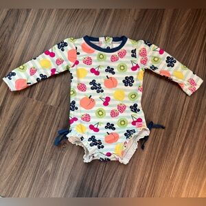 Ruffle Butts - Fruit Fiesta Long Sleeve Rash Guard One Piece | 12-18 months